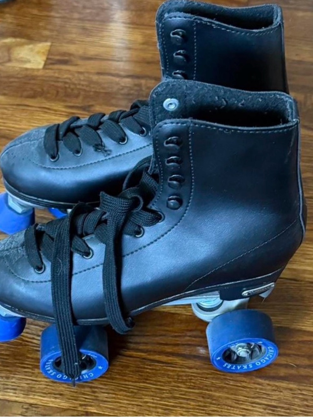 Classic Black Leather Quad Roller Skates with Blue Wheels